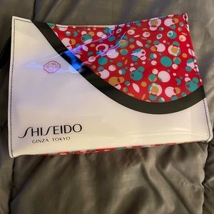 Shiseido Gonzalo Tokyo cosmetics bag with samples include